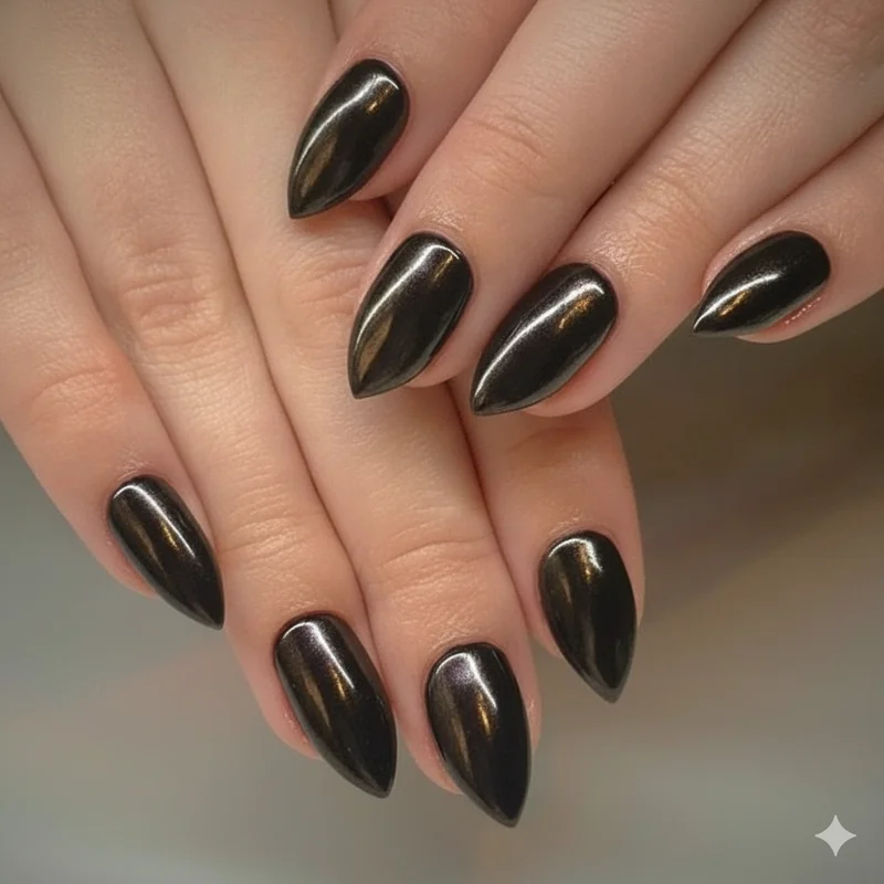 Chrome powder goth nail art showing mirror metallic black gel polish dark gothic effect for home manicure DIY without salon visit