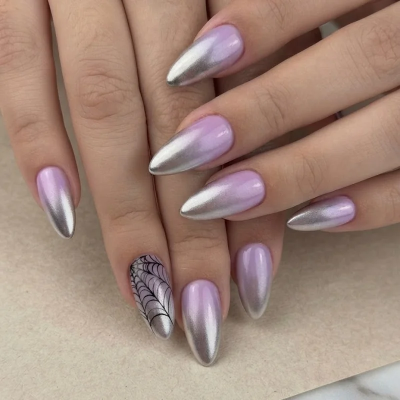 Black halloween nails paired with purple and silver ombre web design combination