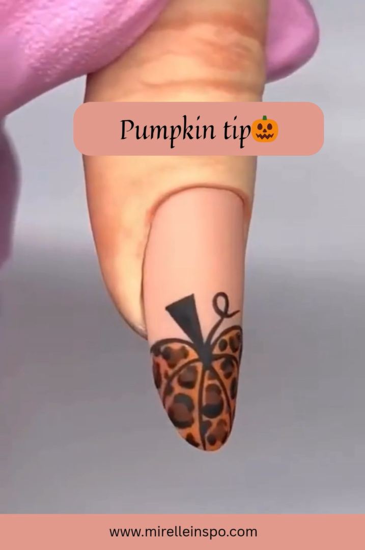 Orange French tip Halloween nail design on nude base