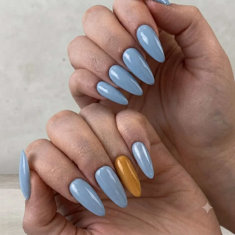 Grand Teton national park nails in cold alpine blue with a warm golden hour amber accent