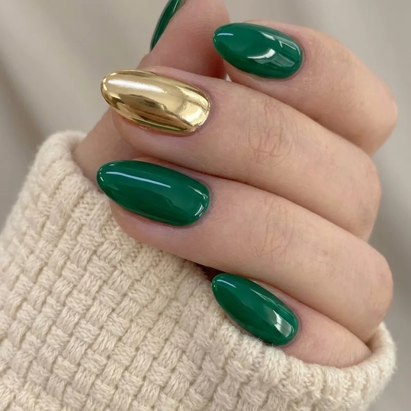 Emerald green glossy hoco nails with gold accent nail in almond shape