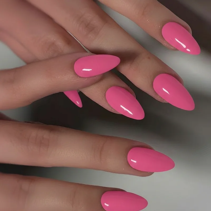 Fair skin cool undertone wearing blue-based hot pink nail polish showing how the shade reads electric without washing out