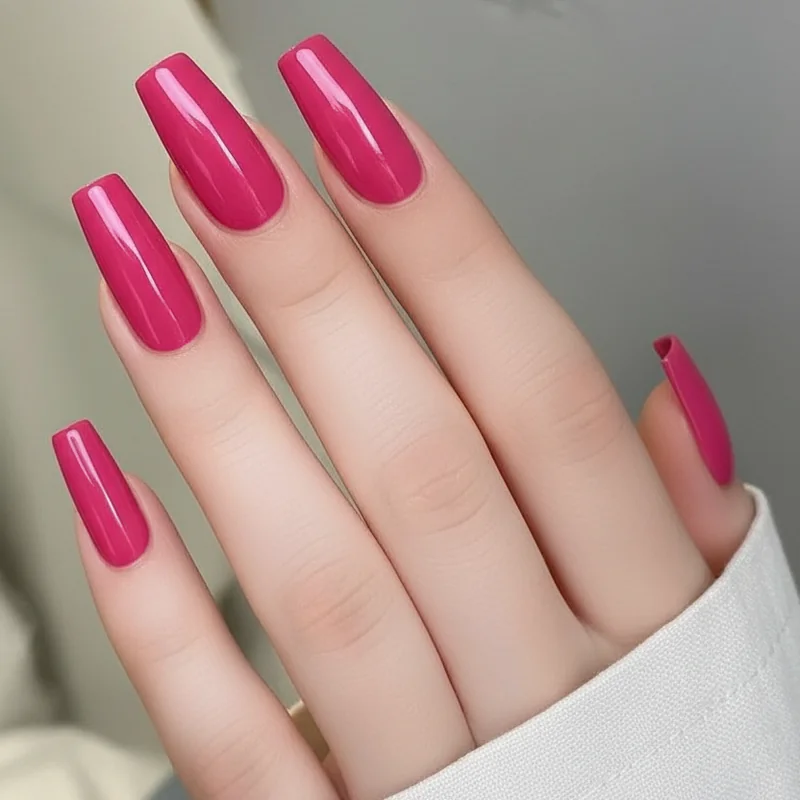 Hot pink nails summer outfit pairing with white linen shirt and denim showing how neutral tones balance the shade nicely