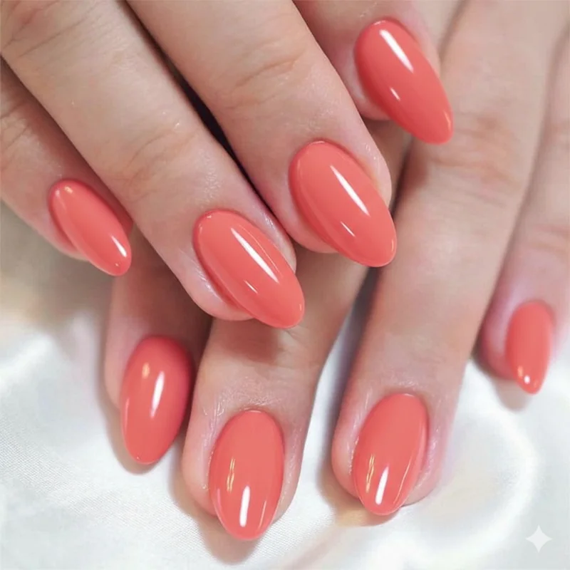 Medium tan skin warm undertone wearing orange-based hot pink gel nails summer showing rich deep pigment saturation on hands