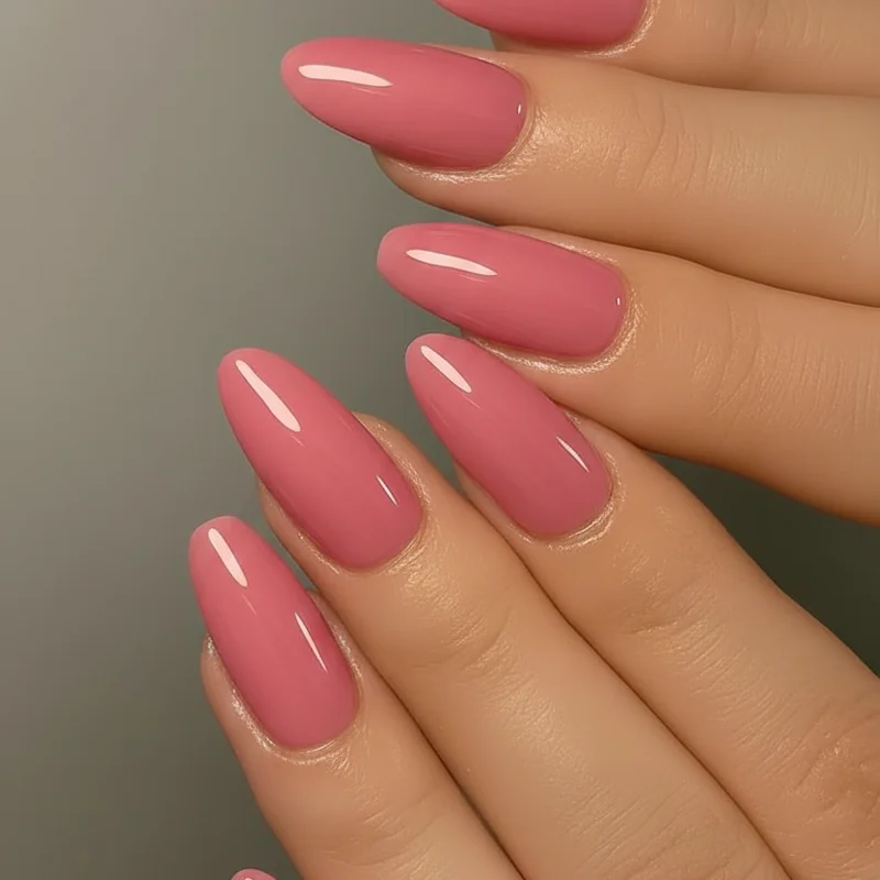 Short nails in hot pink summer manicure comparing almond oval and coffin shapes to show which maximises the colour impact