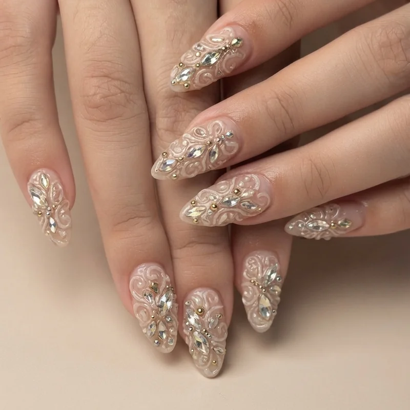 Elaborate nail designs featuring 3D embellished textured nail set with gems and raised gel piping