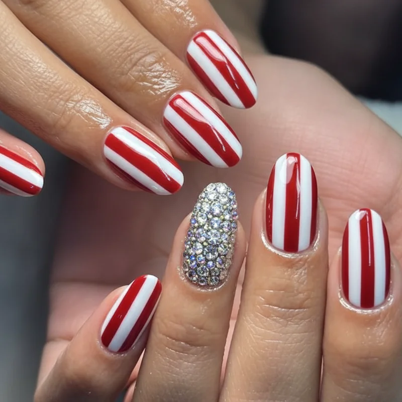 Bold 4th of july nail designs with diamond accent nail and red white stripes