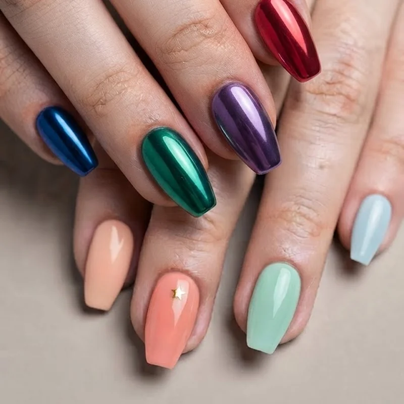 Bold jewel tone chrome nail set contrasted with soft pastel tropical manicure comparison