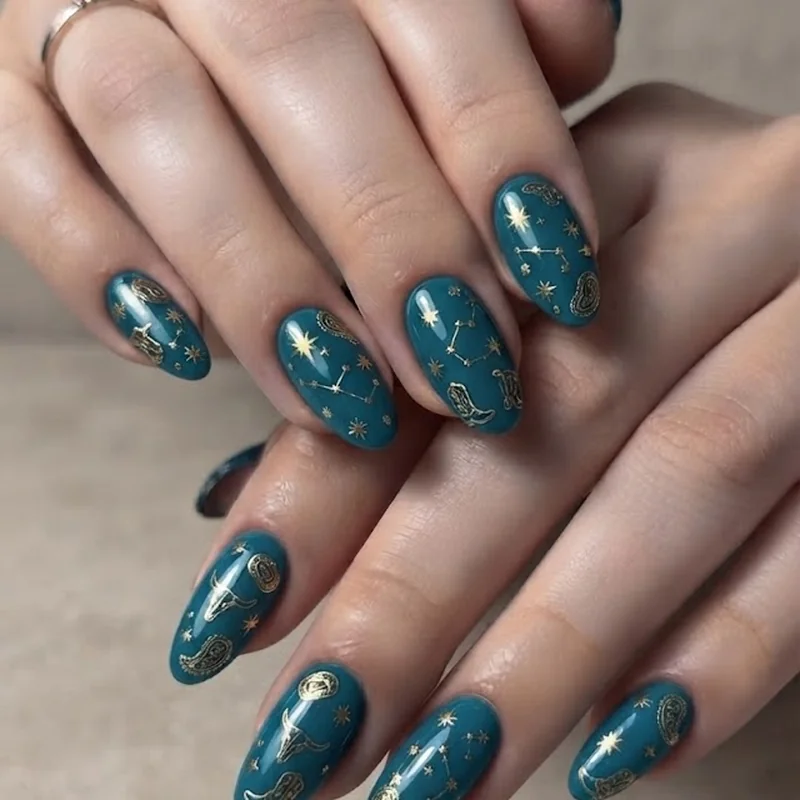 Disco cowgirl concert nail design featuring metallic gold western accents and star detailing for concert night outfit vibes
