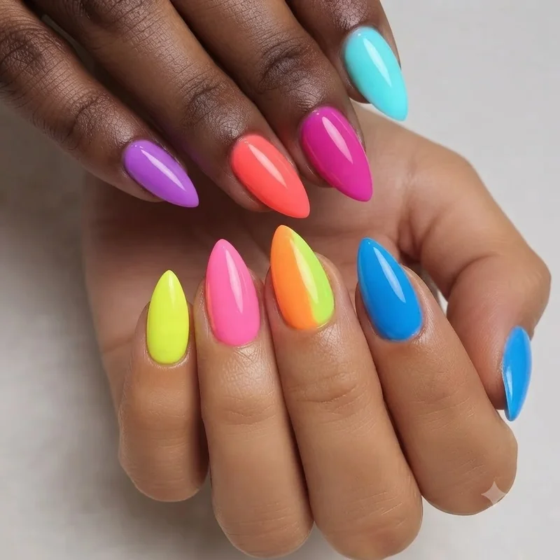 Mixed multi neon stiletto nail set featuring different fluorescent colour on each nail