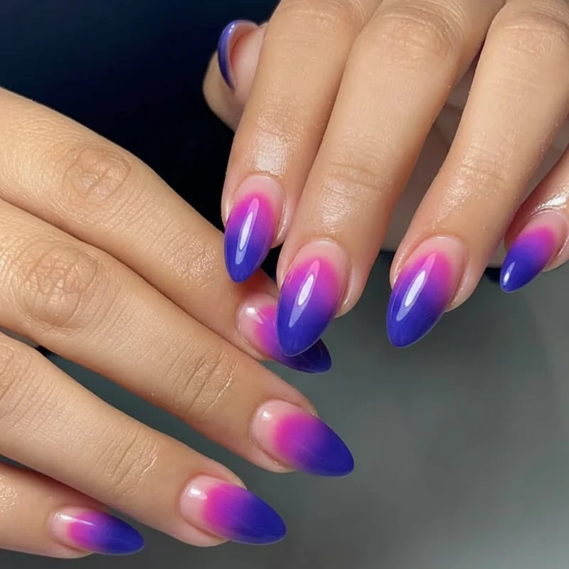Bi aura nails versus bi ombre nails side by side showing radial centre glow versus linear cuticle to tip gradient in pink purple and blue palette