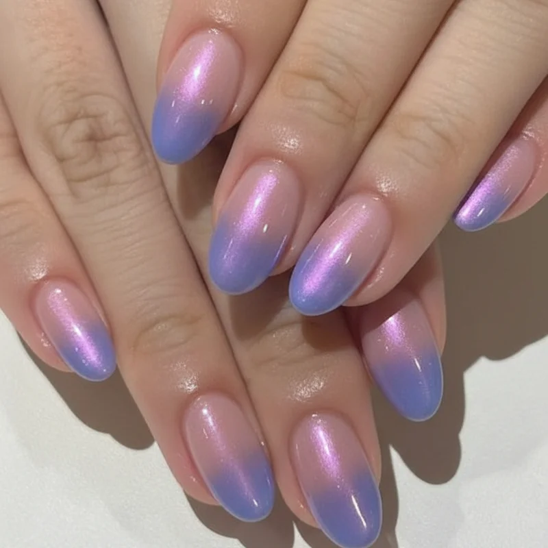 Bi pride nail design variations flat lay showing pink purple blue ombre chrome pastel and accent nail interpretations of bisexual flag gradient palette