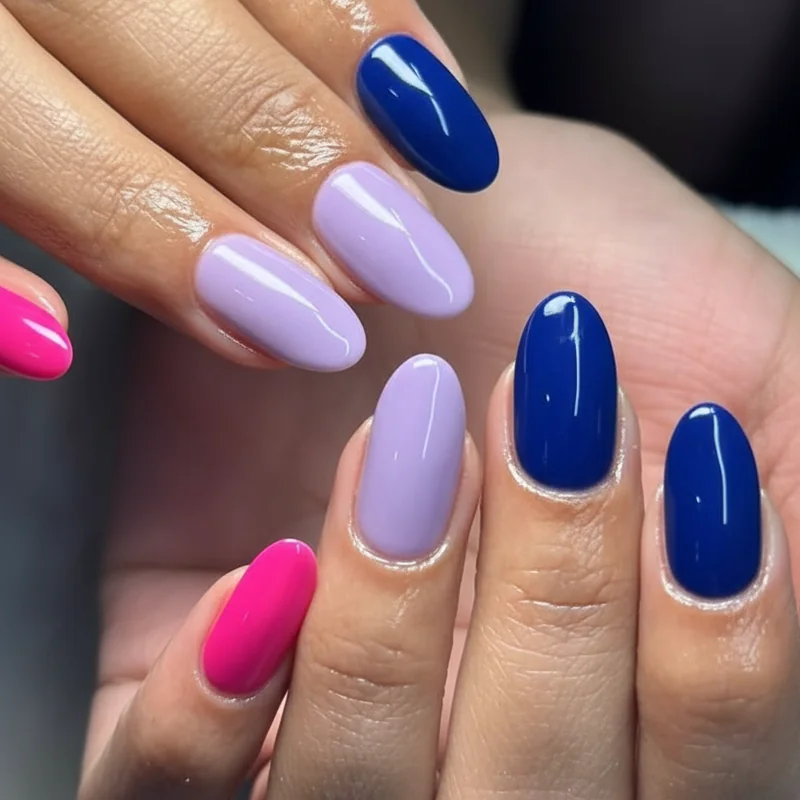 Bisexual flag pink purple and blue nail polish shade guide showing hot pink dusty rose cobalt periwinkle palette variations