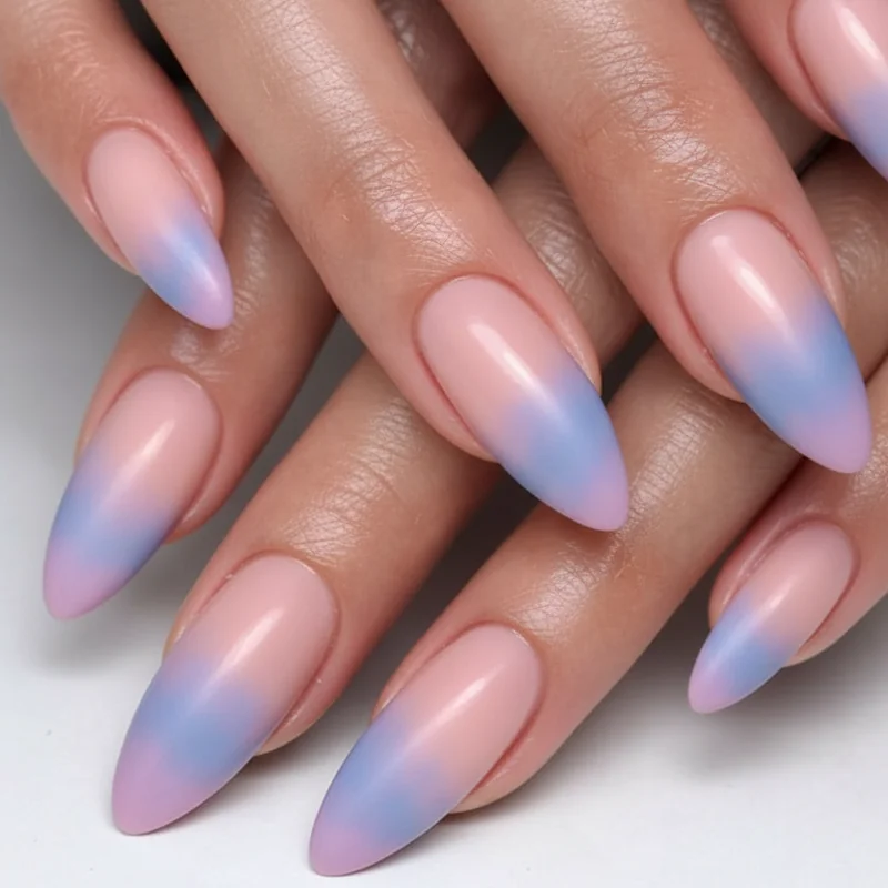Pastel bi almond nails in soft blush pink lavender and dusty blue showing dreamy muted bisexual flag palette on almond shape
