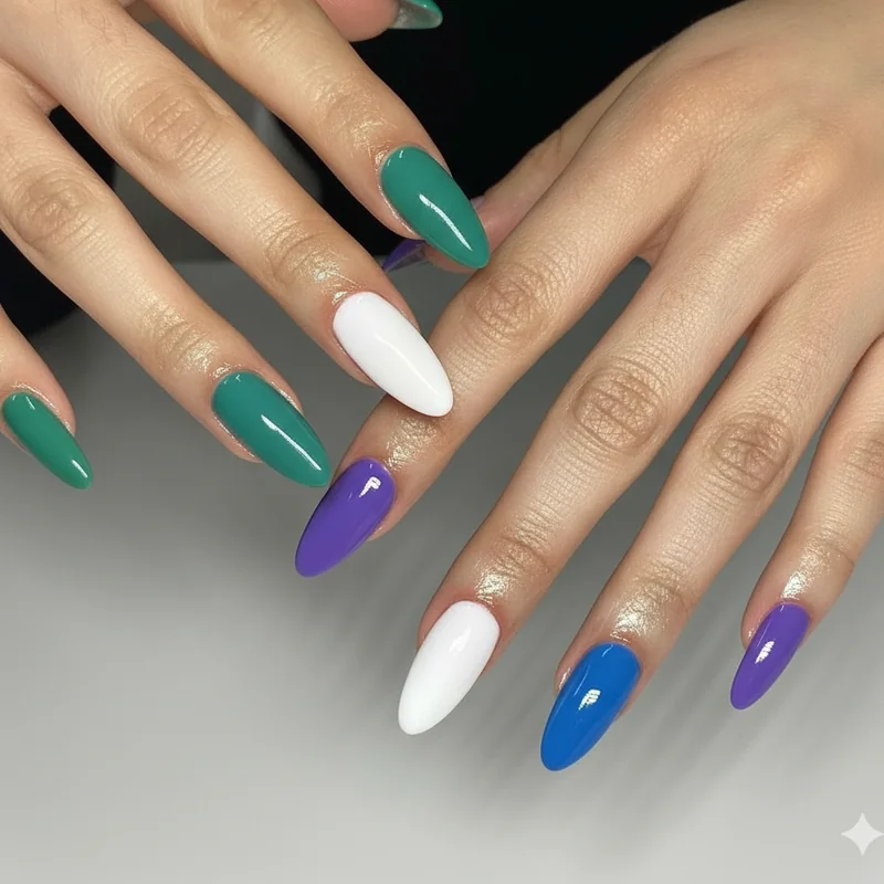 Gay mens pride flag nail art featuring green teal white blue and purple skittle manicure design for LGBTQ identity expression