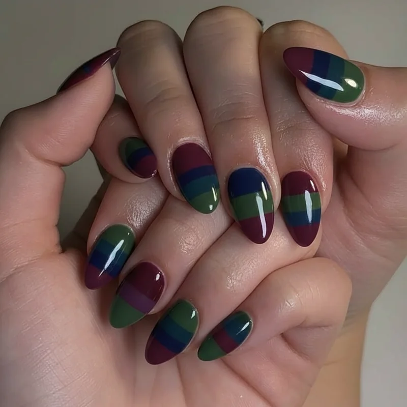 Gay nails worn year round showing autumn winter identity palette queer nail art in muted flag colours for everyday LGBTQ expression
