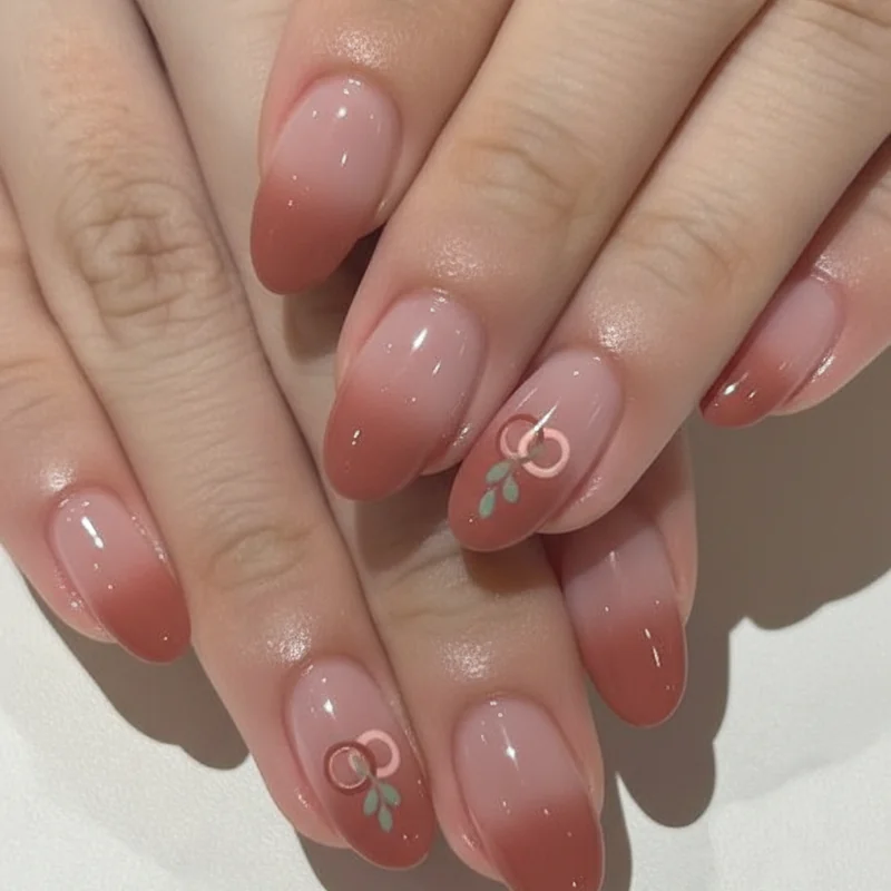 Subtle lesbian nails for work showing terracotta peach and nude accent designs that signal WLW identity quietly and professionally