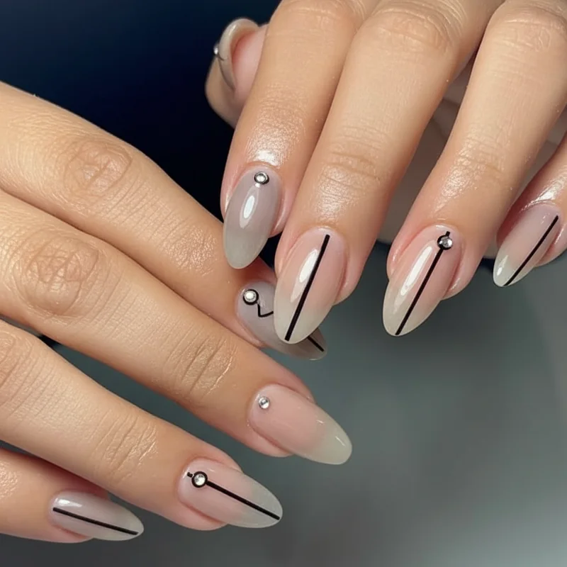 Androgynous nail designs showing sheer grey satin and neutral minimal finishes for WLW streetwear and gender fluid presenting aesthetics