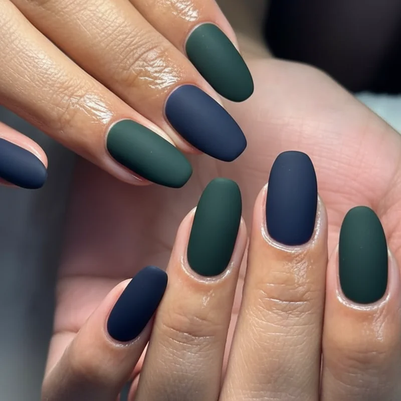 Matte black navy and forest green dark solid monochromatic masc lesbian nail designs on short square nails for WLW aesthetics