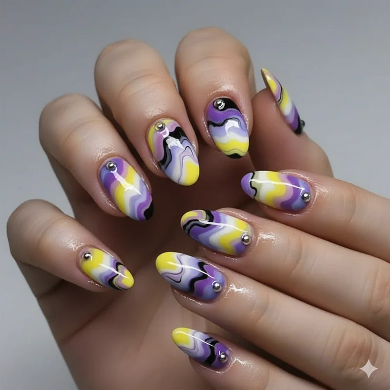 Watermarble nonbinary flag nails showing swirled yellow white purple and black polish blend on short oval nail shape close up