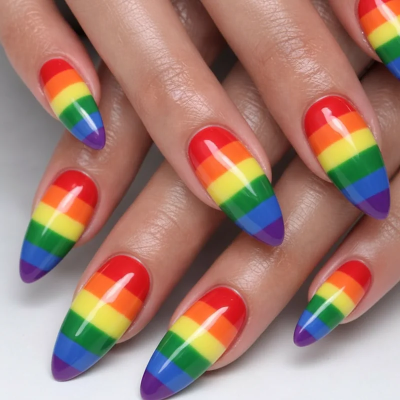 Nail technician reviewing client reference images for pride acrylic nail design brief showing consultation and colour palette confirmation process