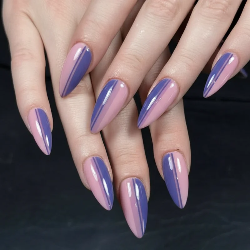 Bisexual identity expression through soft pink purple and blue nail palette showing understated bi pride manicure on natural nails