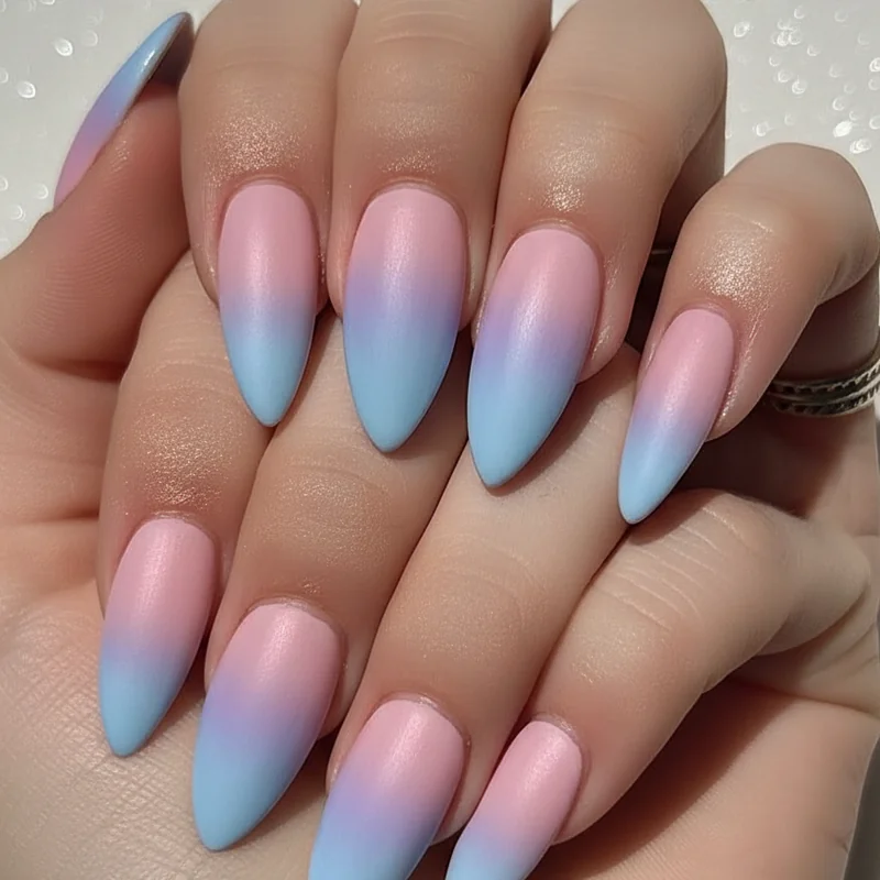 Soft ombre gradient bi nails showing pink purple and blue sponge blend technique for subtle bisexual flag fade manicure