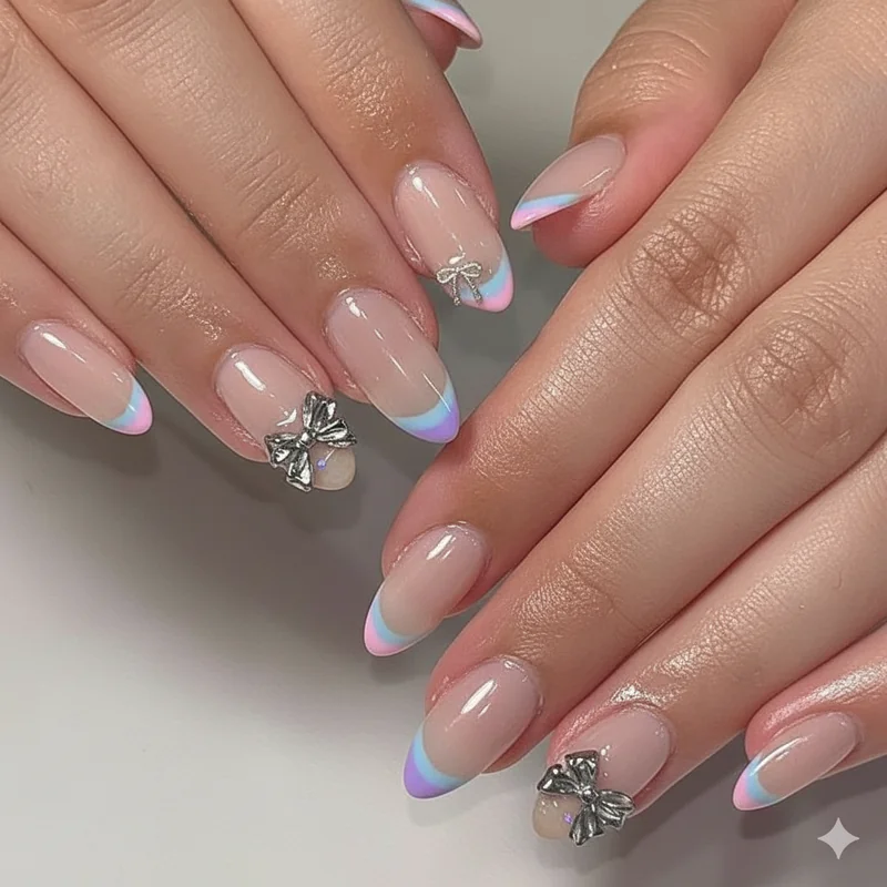 Subtle bi French tip nails showing micro pink purple and blue tips on natural base for minimalist bisexual pride manicure design