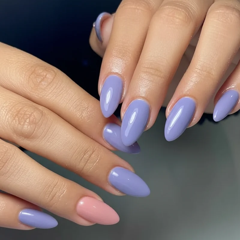 Subtle bi palette nail polish shade guide showing dusty pink lavender and periwinkle blue options for sophisticated bisexual manicure