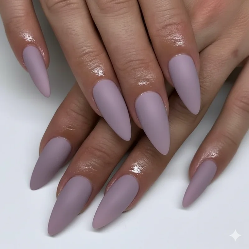 Side by side comparison of subtle versus bold nonbinary nail designs showing single colour minimalist approach against full flag saturation style