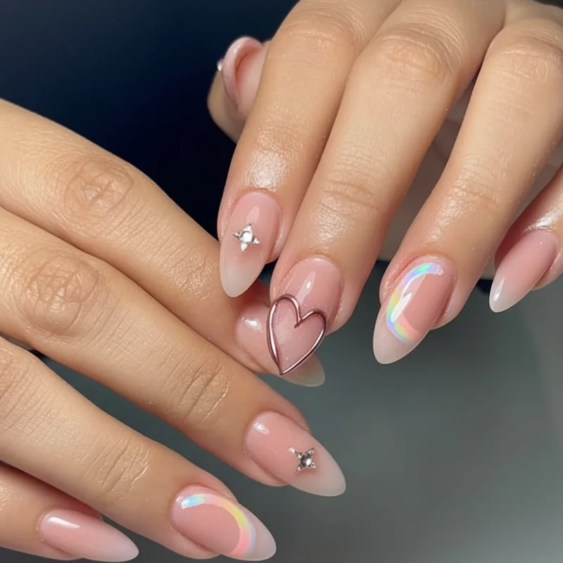 Year-round subtle pride nails using muted desaturated iridescent and negative space techniques for everyday wear beyond June Pride Month