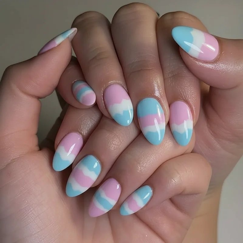 Trans affirming nail salon showing welcoming acrylic appointment setting with trans pride flags and pink blue decor in 2026