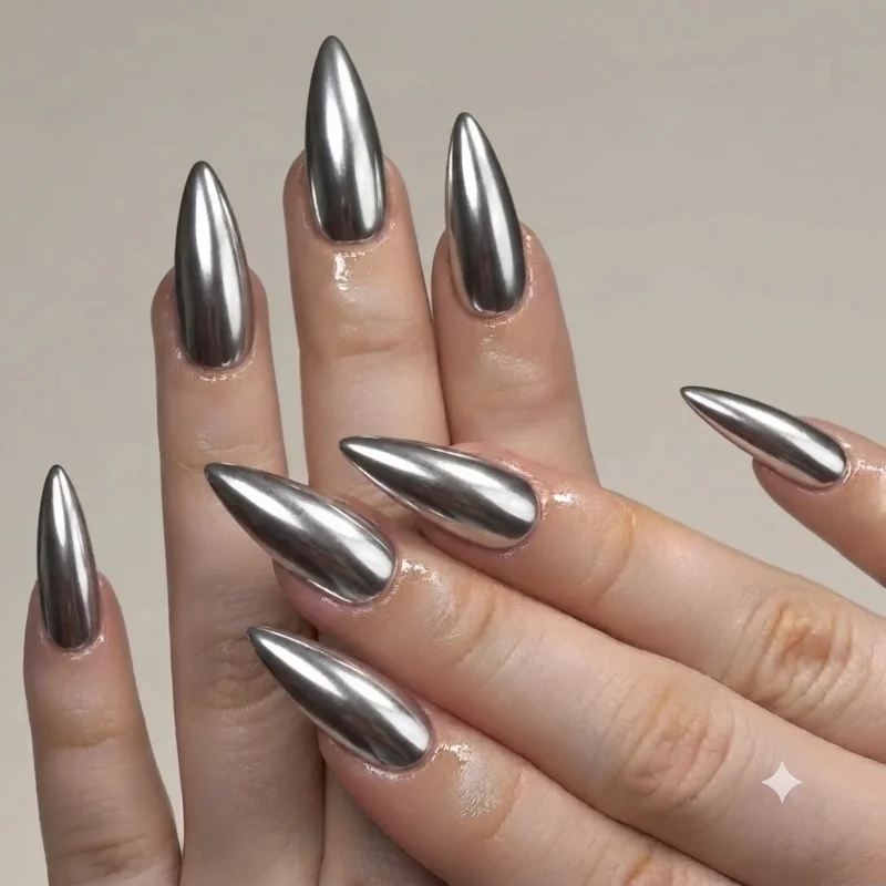 Bold chrome statement nail design styled for Hilary Duff Lucky Me Tour concert look
