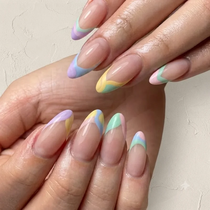 Y2K pastel wave French tip nail design inspired by Lizzie McGuire nostalgic colour palette