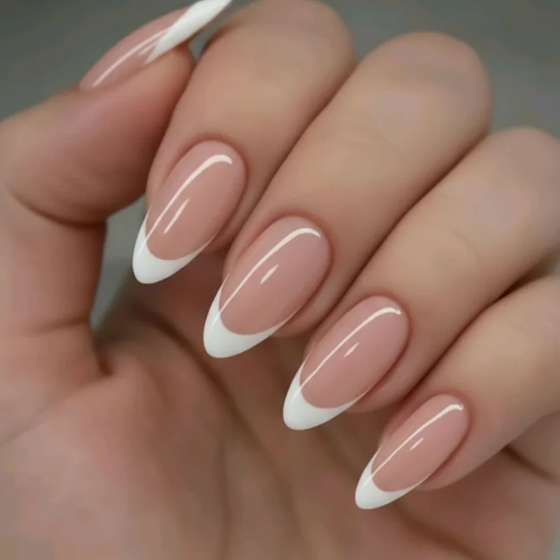 Capping the free edge with top coat showing brush technique to seal micro french tip and prevent chipping on natural nails