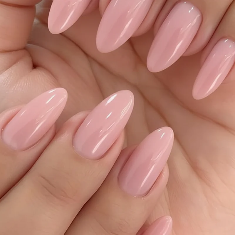 Milky pink nail polish swatches on fair medium and deep skin tone hands showing undertone variation warm cool and neutral formulas