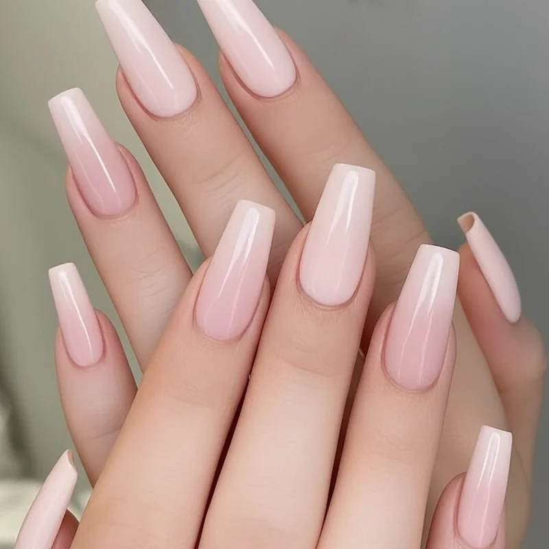 Milky pink nail swatch next to sheer pink showing white pigment ratio difference and opacity depth comparison on natural nail