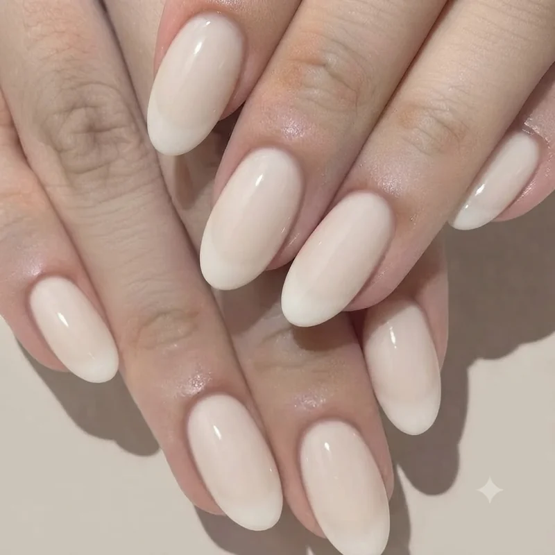 Blueberry milk and lavender milk nails shown side by side in soft cool toned sheer manicure shades