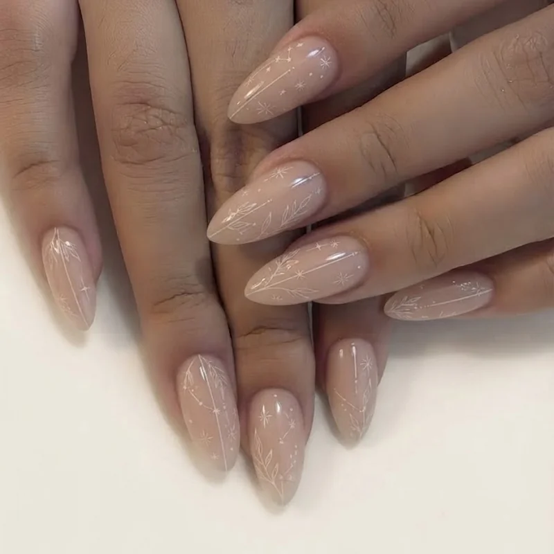 Finished minimalist manicure on polished hand, sheer nude base with fine line detail, aspirational shot