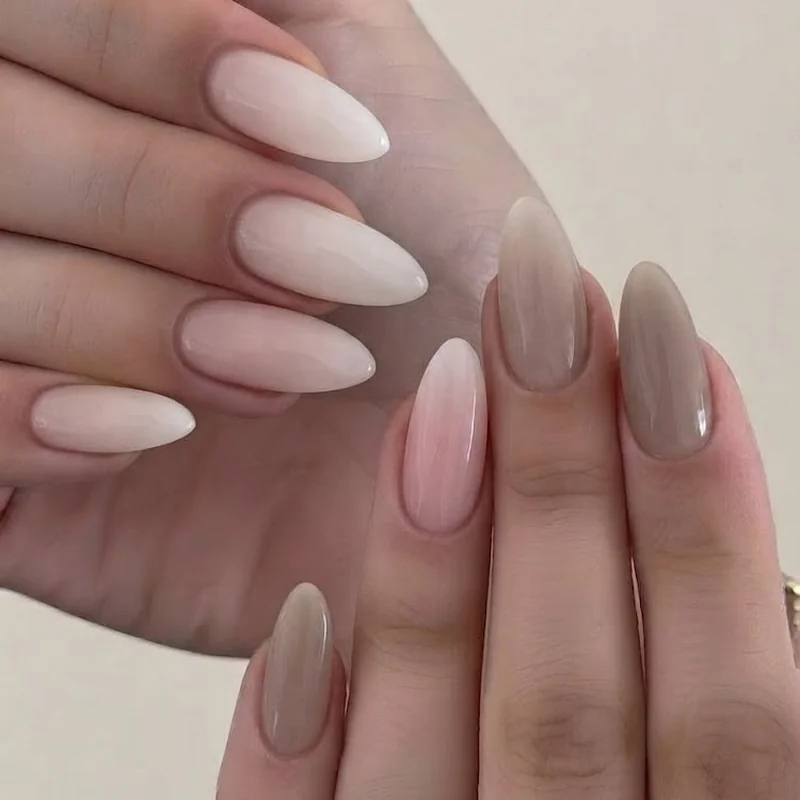 Sheer nude polish palette with milky white porcelain pink and taupe minimalist manicure swatches