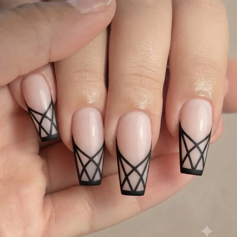 Negative space nail art on a coffin shape showing how the design adapts across nail shapes