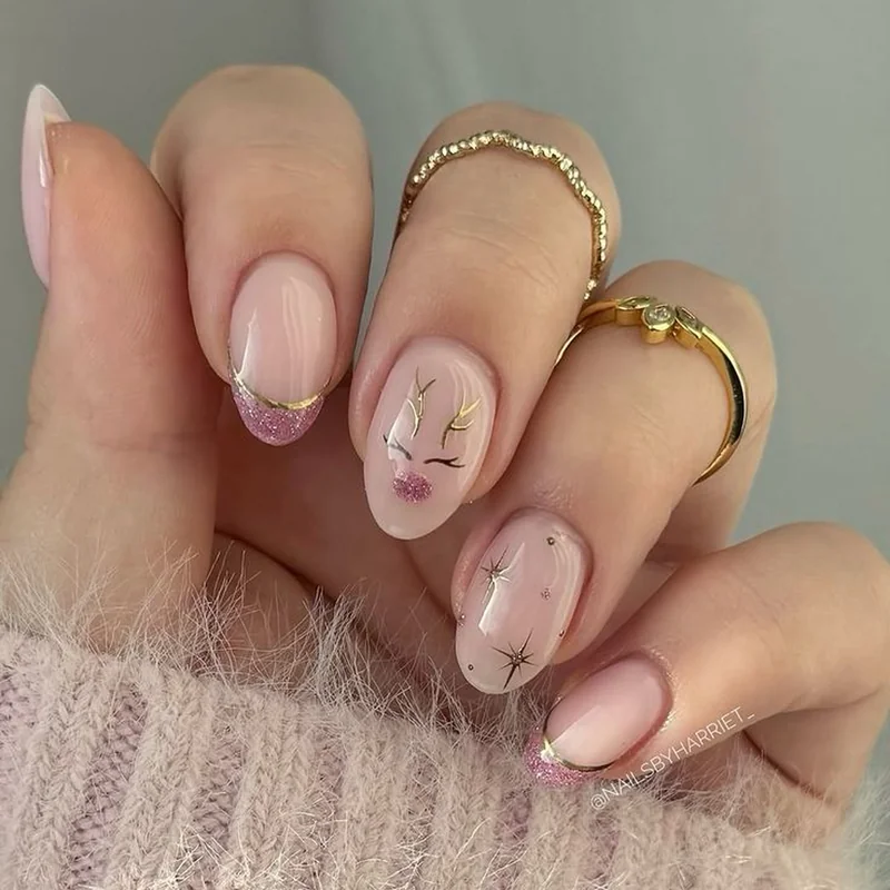 Minimalist reindeer antler silhouette nail design on nude base polish