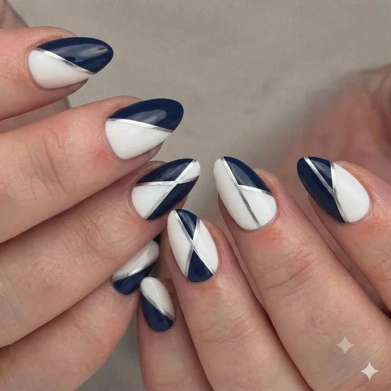 Clean geometry nail art idea using striping tape for hard, angled lines dividing the nail into two colour graphic sections