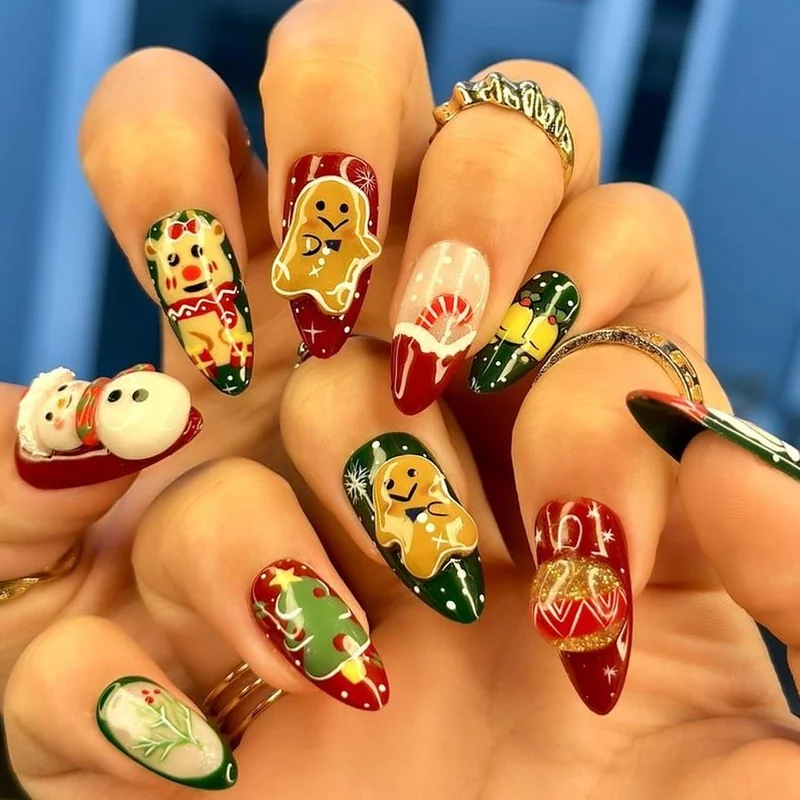 Mix and match Christmas nail set featuring Santa on ring finger, Rudolph on middle finger, coordinated with red polish