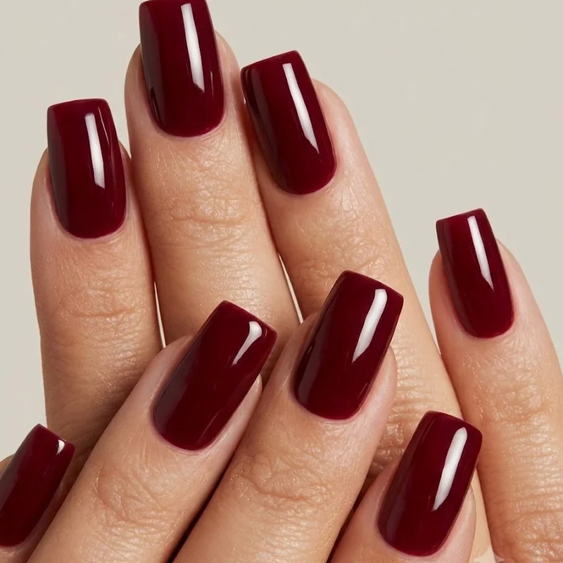 Flatlay of varied manicure styles representing nail colors trends by decade over 100 years