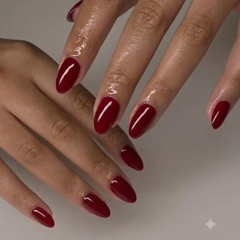Old Hollywood glamour red manicure evoking decades of most popular nail colors of all time