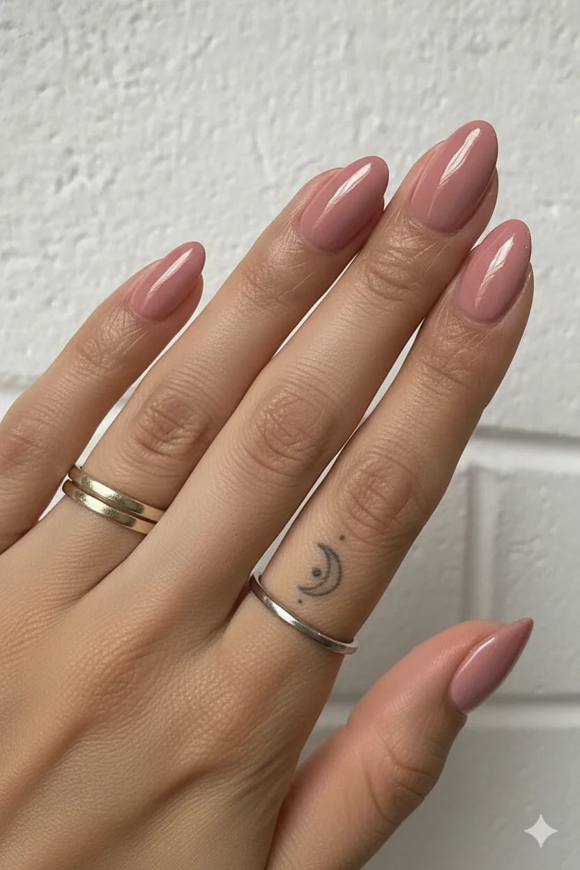 Muted rose almond shape mothers day nail timeless elegant spring 2026 manicure sophisticated dusty pink clean finish refined