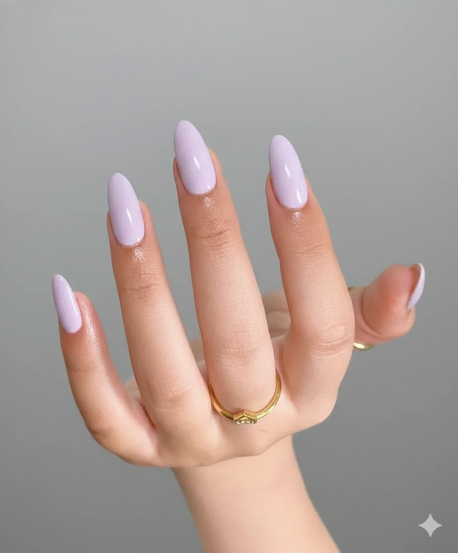 Pearl finish squoval shape mothers day 2026 sheer base modern manicure inspiration with iridescent top coat shimmer