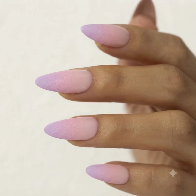 Ombre gradient nail art created with a makeup sponge blending technique