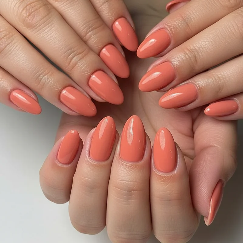 Warm blonde nail colors including coral peach terracotta and latte shades perfect for golden honey and strawberry blonde hair types